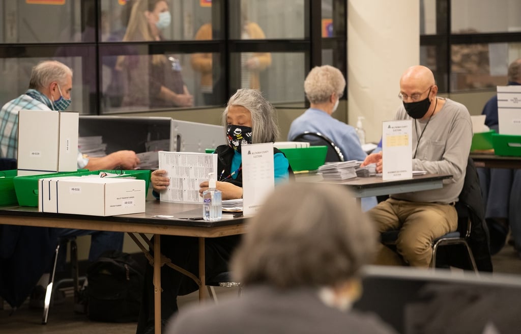 Election workers process ballots in Multnomah County in 2020