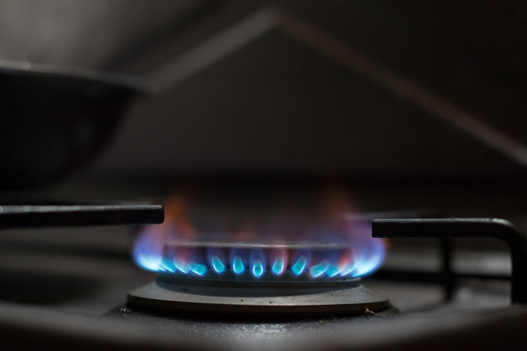 Blue flames on a household gas stove