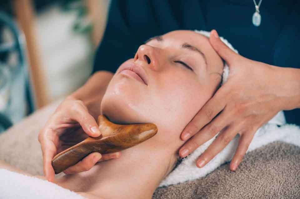 how to do a lymphatic drainage face massage