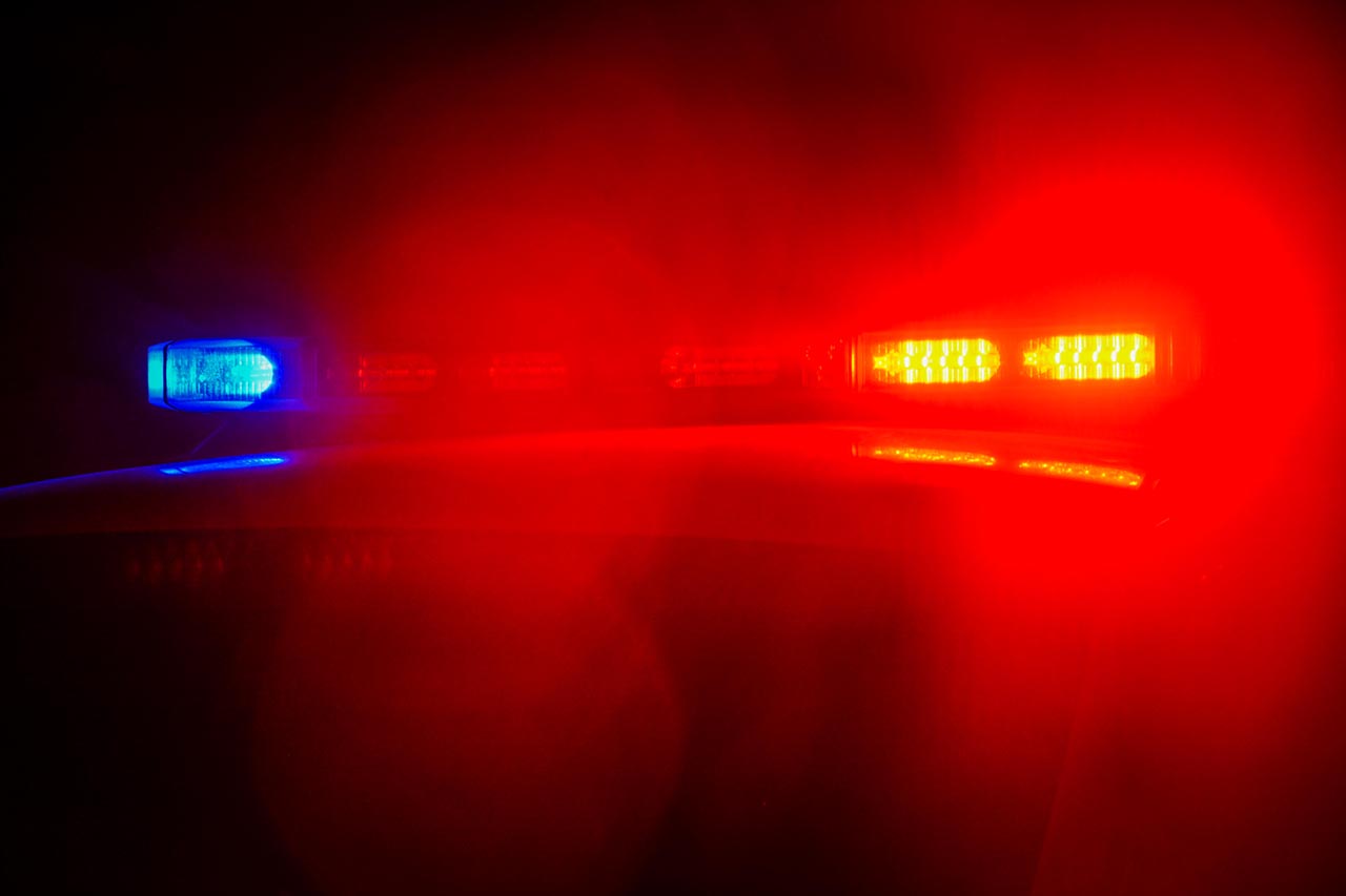 Red and blue flashing police car lights